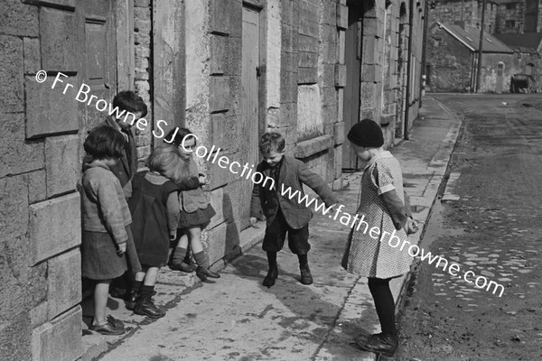 CHILDREN PLAYING IN STREET